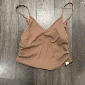 Vuori Ribbed V-Neck Tank Top in Brown Tan